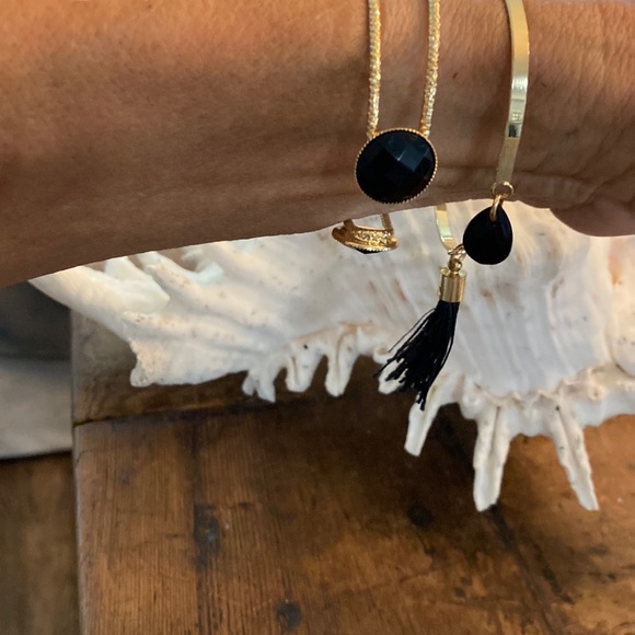 Pretty gold tone, bracelets with black stones. - Picture 3 of 6